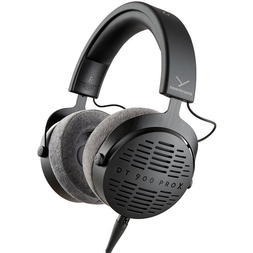 Beyerdynamic DT 900 Pro X studio headphones with over-ear design and adjustable headband, black color, on a plain background.