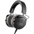 Beyerdynamic DT 900 Pro X studio headphones with over-ear design and adjustable headband, black color, on a plain background.