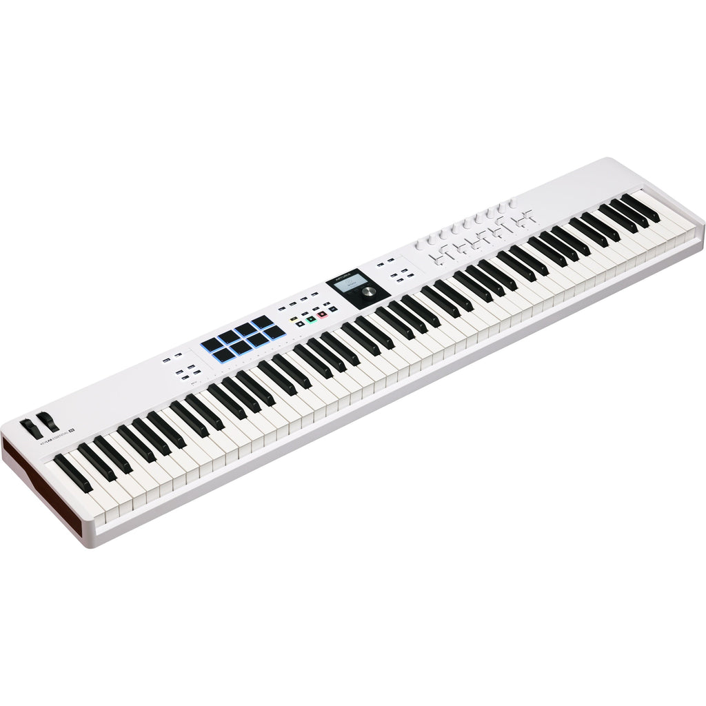 Arturia KeyLab Essential 88 MK3 keyboard controller with studio bundle including software and accessories for music production.
