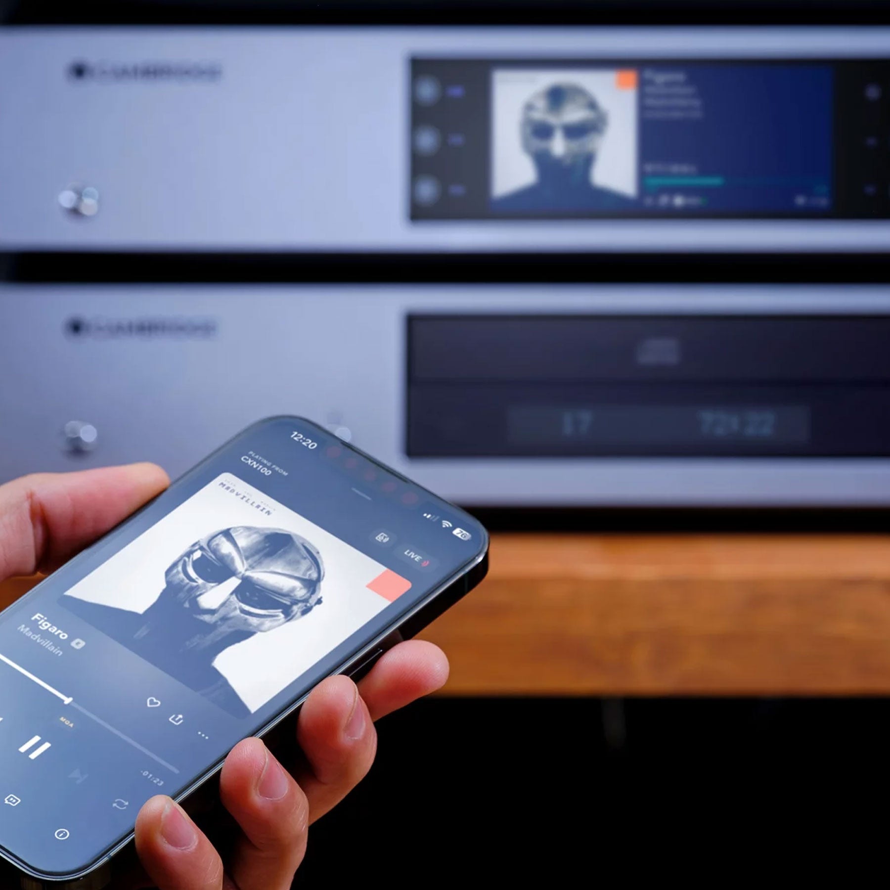 Cambridge Audio CXN100 SE music streamer with digital display and control buttons, black front panel, and network connectivity features.