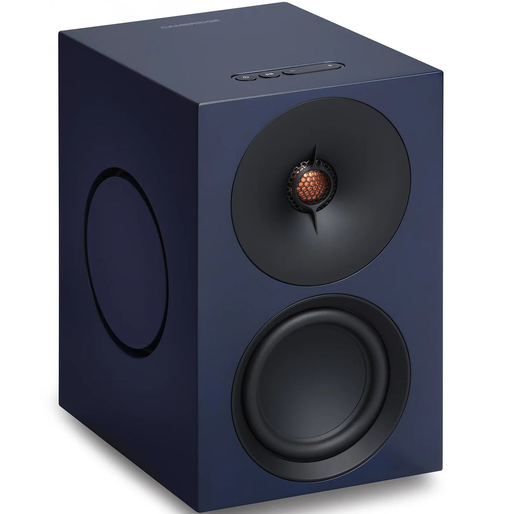 Cambridge Audio L/R M active bookshelf speakers in blue, showing the sleek front view with speaker grille and control knobs.