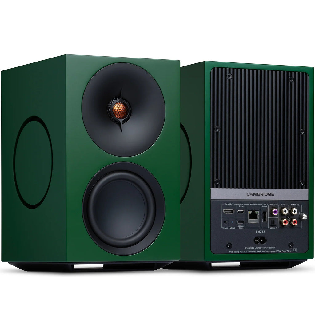 Cambridge Audio L/R M active bookshelf speakers in green, showing front view with speaker grille and sleek design.