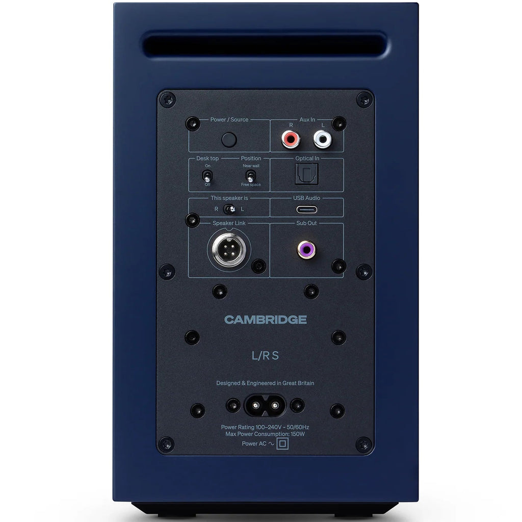Cambridge Audio L/R S active bookshelf speakers in blue, showcasing front view with speaker grilles and control knobs.