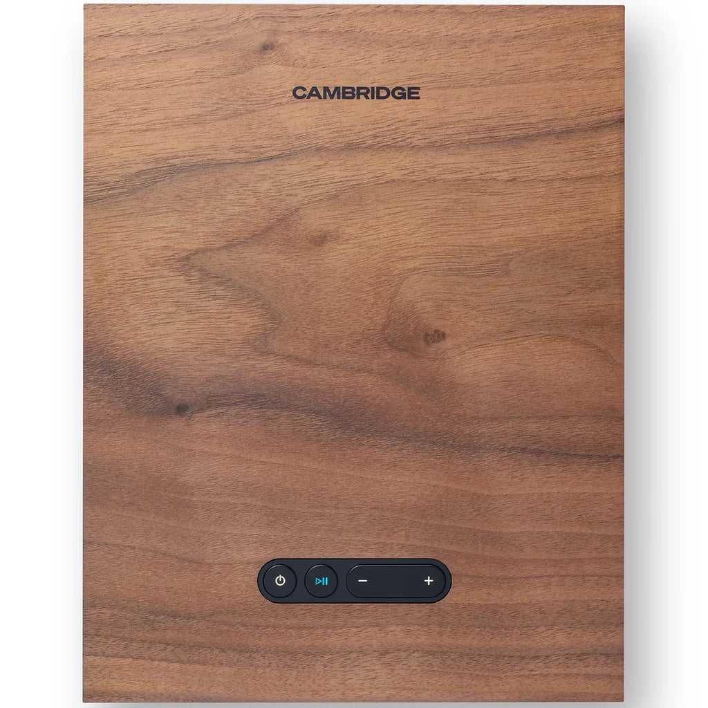 Cambridge Audio L/R X active bookshelf speakers in walnut finish with sleek design and visible driver components.