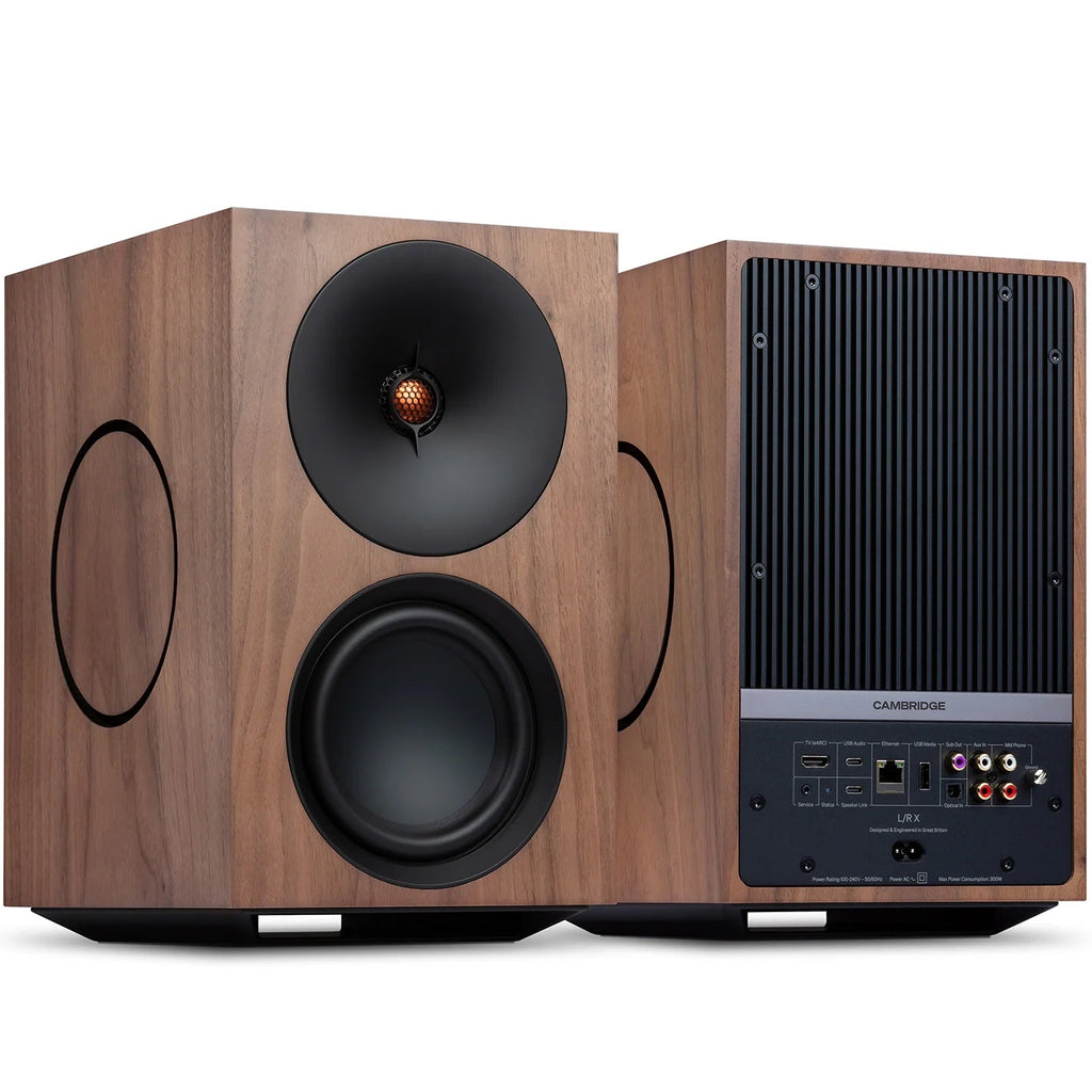 Cambridge Audio L/R X active bookshelf speakers in walnut finish, showcasing front view with sleek design and speaker grilles.
