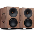 Cambridge Audio L/R X active bookshelf speakers in walnut finish, showcasing sleek design and wood grain texture.