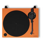 Cambridge Audio Spira turntable in Orange, top-down view of platter and tonearm