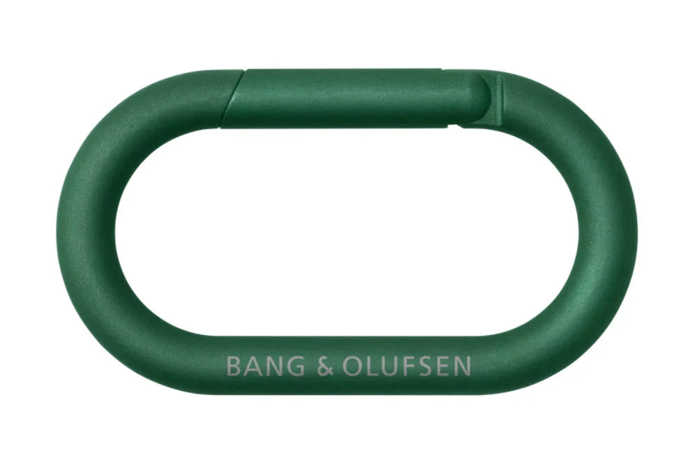Bang & Olufsen Beosound Explore portable speaker with carabiner attachment, showing the front view and sleek design.