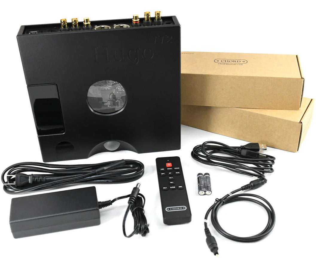 Chord Electronics Hugo TT2 headphone amplifier and DAC in black, featuring a sleek front panel with various input and control options.