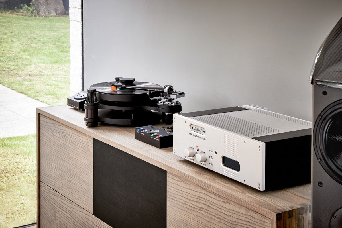 Chord Electronics Huei phono preamp with sleek design and control knobs, perfect for high-quality vinyl record playback.