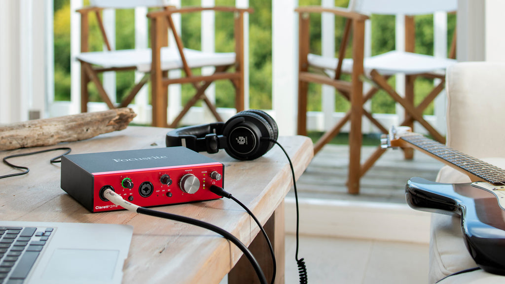 Focusrite Clarett+ 2Pre audio interface with multiple input and output ports, compact design, and professional-grade controls.
