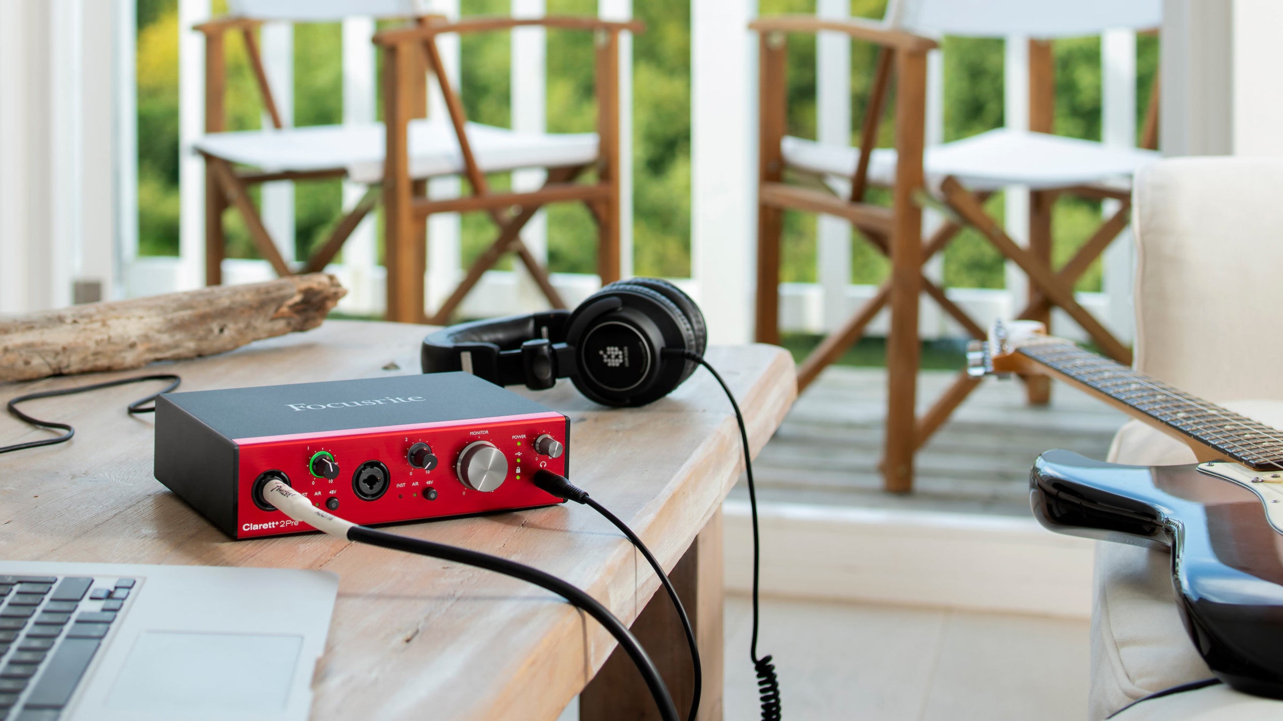Focusrite Clarett+ 2Pre audio interface with multiple input and output ports, compact design, and professional-grade controls.