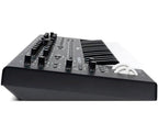 Moog Messenger synthesizer with knobs, buttons, and interface showing a compact Moog synthesizer for music production.