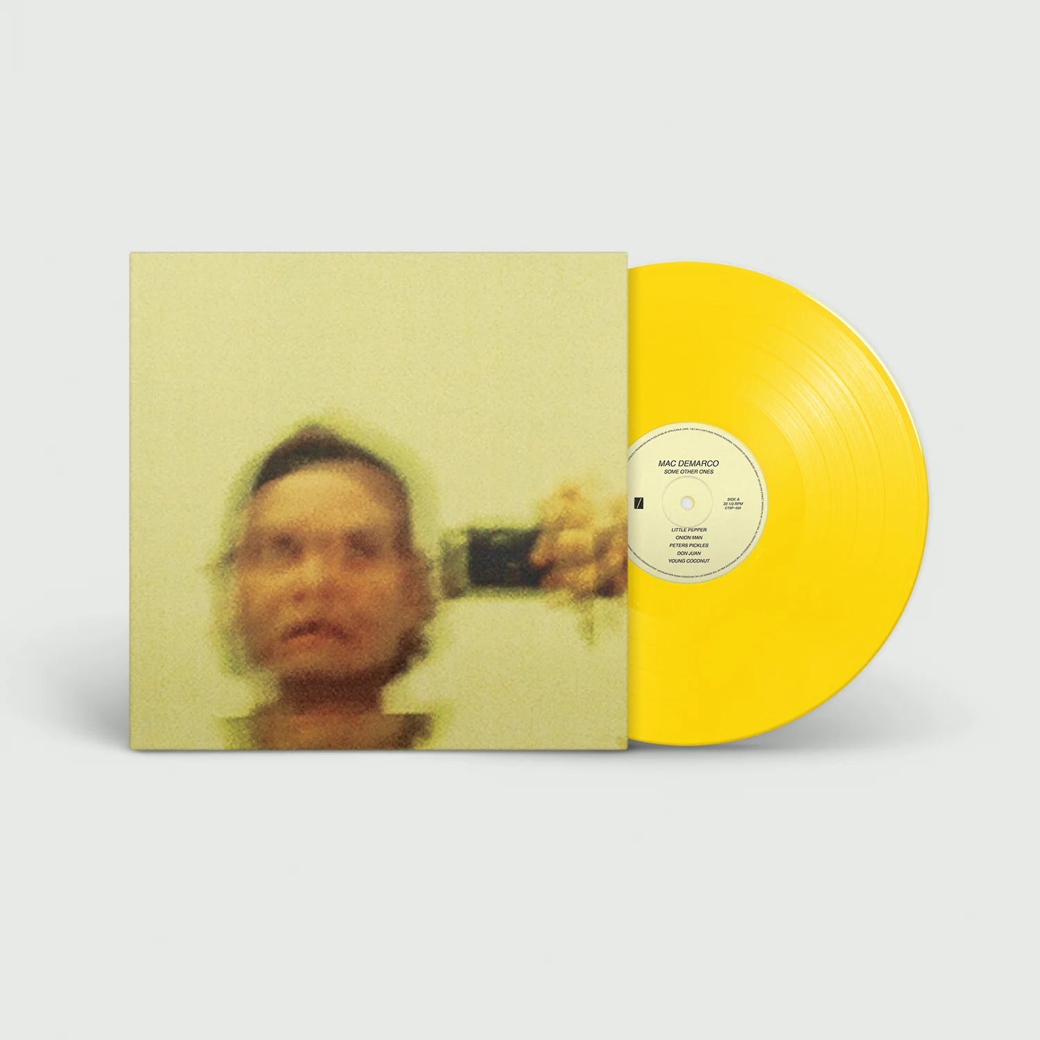 Yellow vinyl LP of Mac DeMarco's "Some Other Ones" by Captured Tracks, featuring colorful album artwork and record label details.