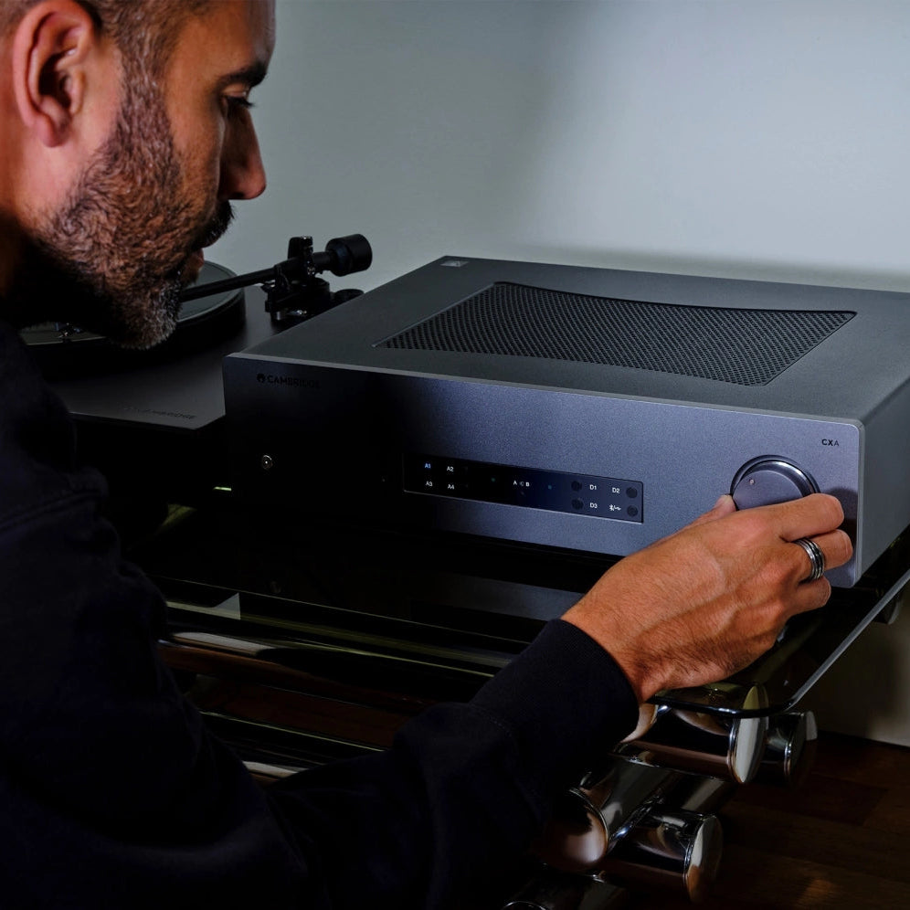 Cambridge Audio CXA81 MK2 stereo amplifier with sleek black design and control knobs, showcasing high-quality audio equipment.