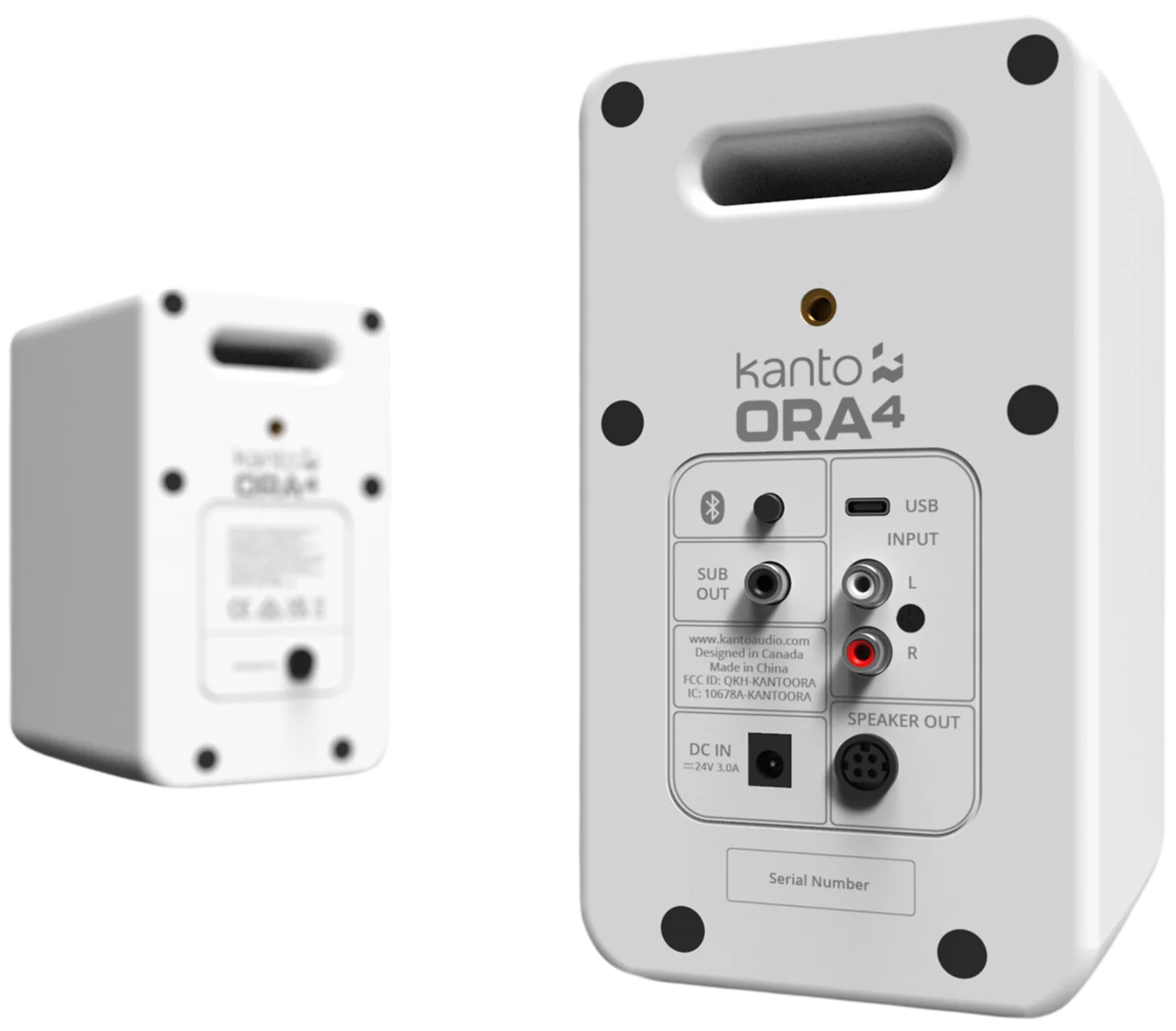 Kanto Audio Ora 4 desktop speakers with sleek black finish and modern design, positioned on a desk with a blurred background.