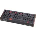 Sequential OB-6 desktop synthesizer module with control knobs and patch points, designed for versatile sound creation.