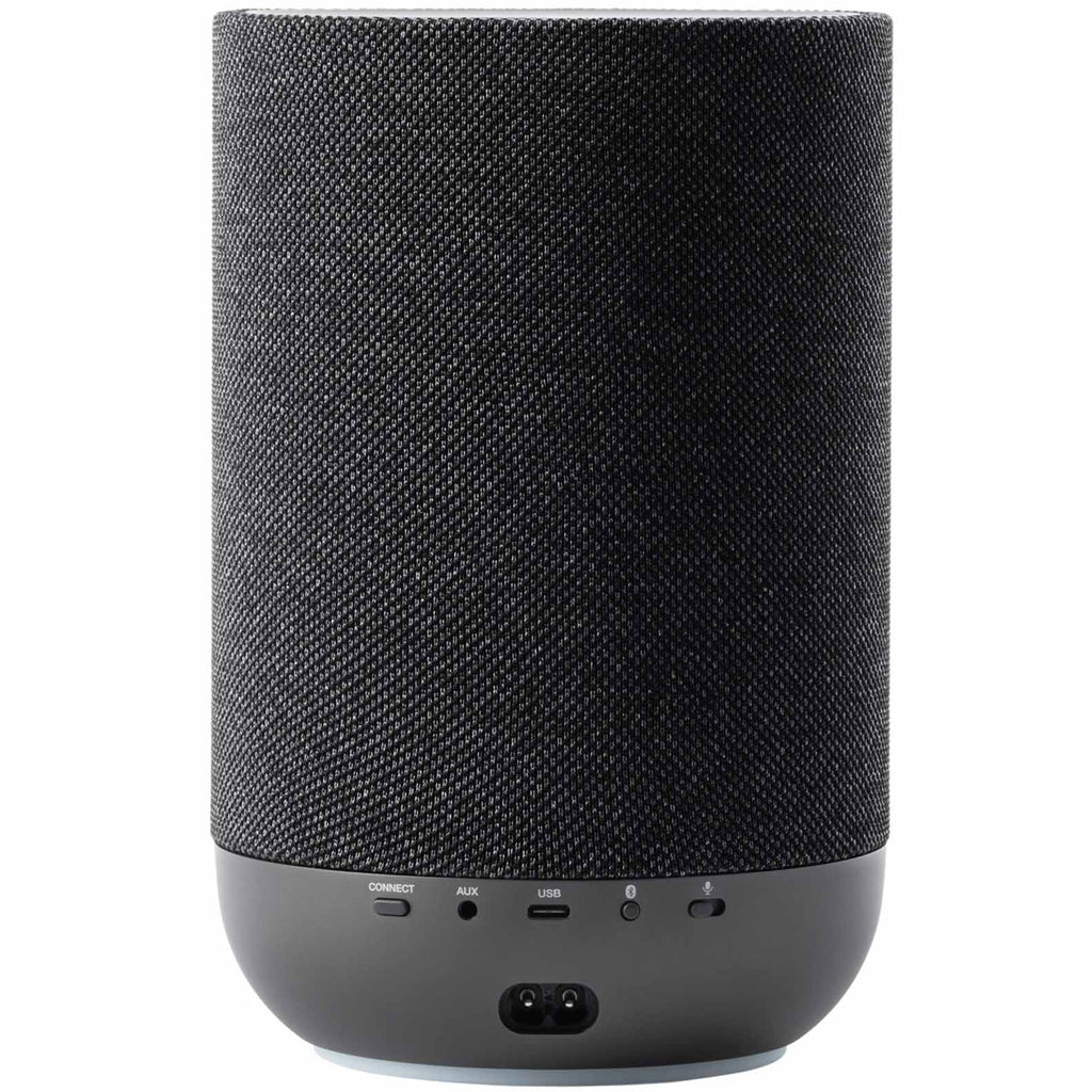 Denon Home 200 wireless speaker in charcoal color, compact design with fabric grille and control buttons visible.