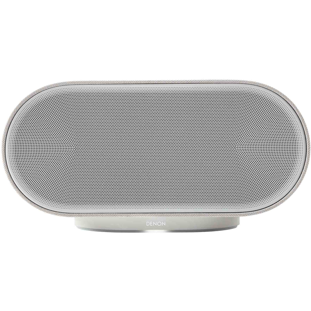 Denon Home 600 wireless speaker in stone color showing a sleek, modern design with fabric grille and control buttons on top.