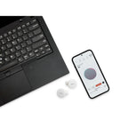 Denon PerL wireless in-ear headphones, lifestyle with companion app on laptop and phone