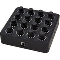 DJ TechTools MIDI Fighter Twister MIDI controller with colorful rotary knobs and buttons for music production and DJing.