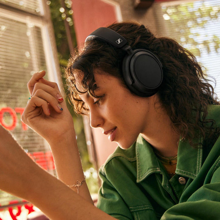 Sennheiser Accentum Plus wireless headphones with over-ear design, black color, and padded ear cushions for comfort.