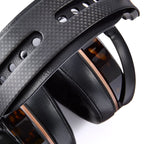 Audeze LCD-5s wired headphones with sleek black ear cups and a sturdy headband, showcasing premium audio design and craftsmanship.