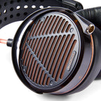 Audeze LCD-5 wired headphones with large ear cups and headband, featuring sleek black design and high-quality audio components.