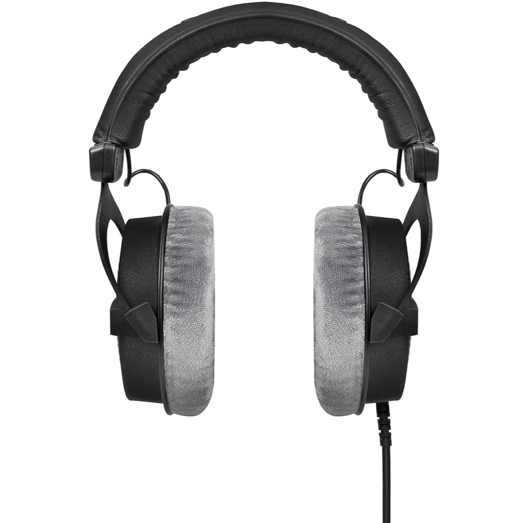 Beyerdynamic DT 990 Pro black studio headphones with open-back design and adjustable headband, front view.