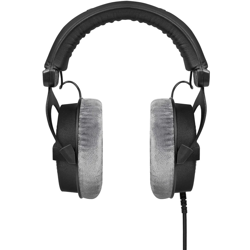 Beyerdynamic DT 990 Pro black studio headphones with open-back design and adjustable headband, front view.