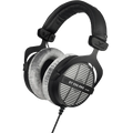 Beyerdynamic DT 990 Pro studio headphones in black with over-ear design and open-back ear cups, featuring adjustable headband.