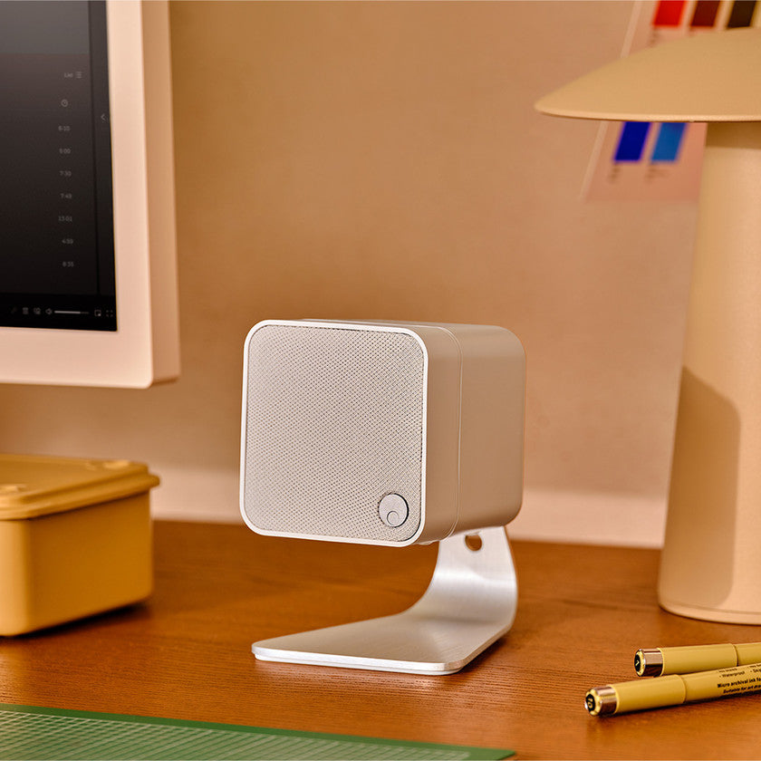 Cambridge Audio MSX 10 speakers with sleek black design and compact size, showing the front grille and control panel.