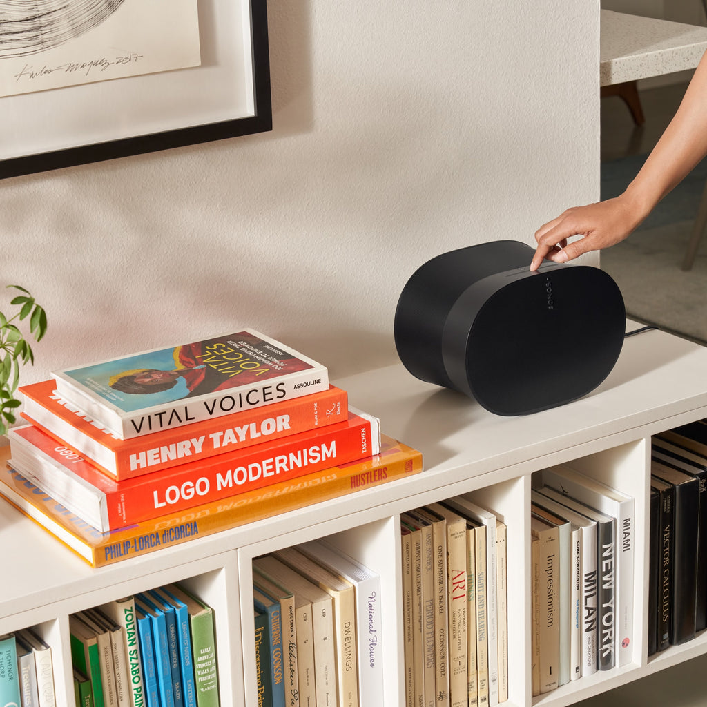 Sonos Era 300 wireless speaker in black, showing the sleek design and control buttons on the front.