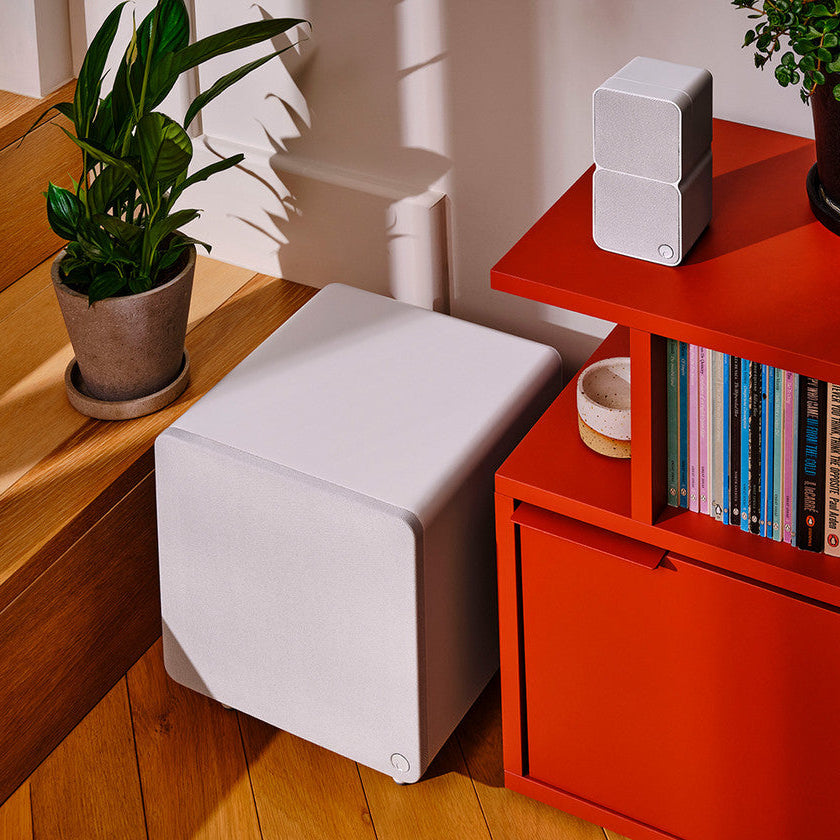 Cambridge Audio MSX Sub 300 subwoofer with sleek black enclosure and front control panel, ideal for enhanced home audio bass.