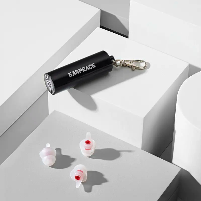 EarPeace Music Earplugs for hearing protection, shown in a sleek black design with soft silicone tips for comfortable ear comfort.