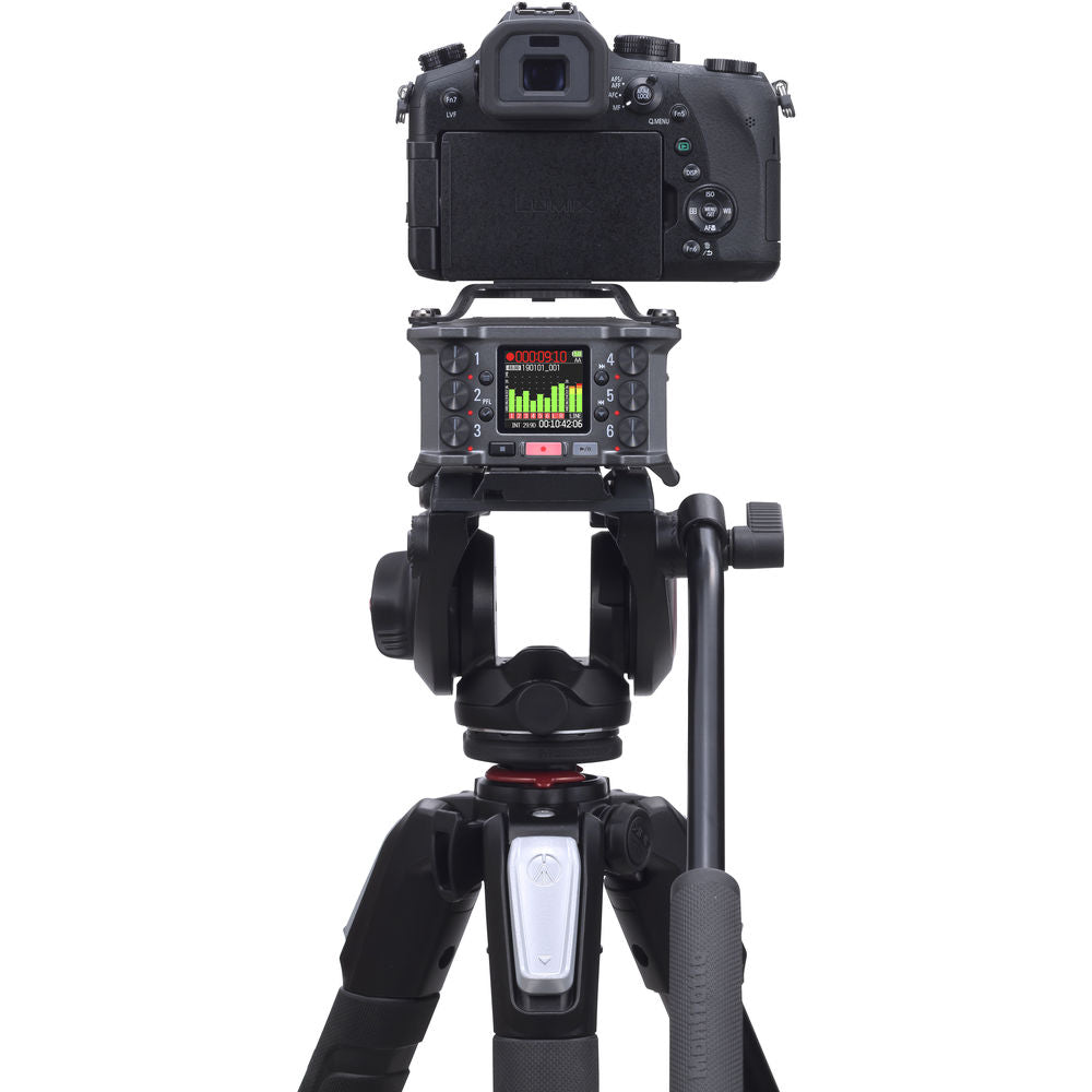 Zoom F6 digital recorder with multiple input jacks and a compact design, shown in a close-up image.