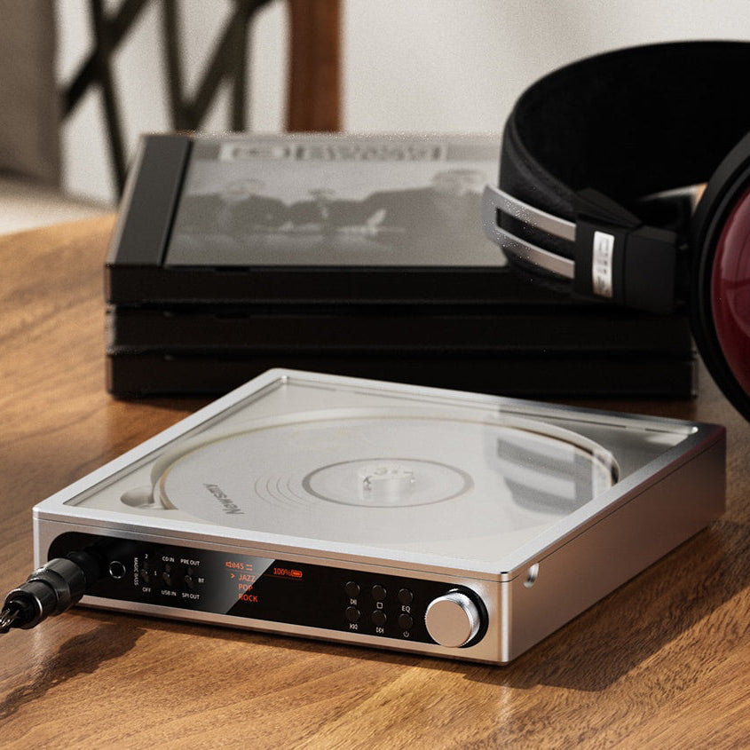 FiiO DM15 R2R silver CD player with display and controls on the front panel, showcasing sleek silver design.