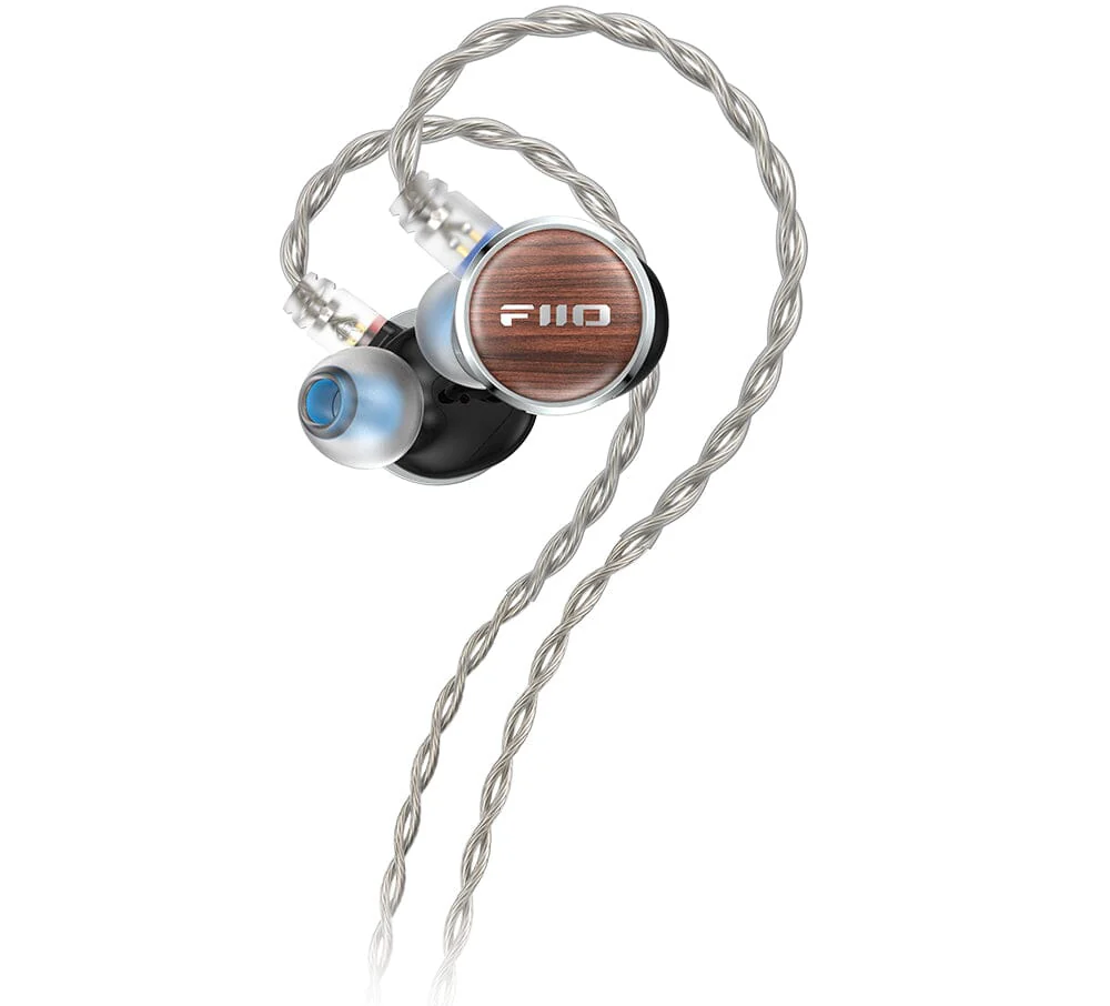 FiiO FP3 in-ear headphones with 145mm planar driver, black earbuds with silver accents, designed for high-quality sound.