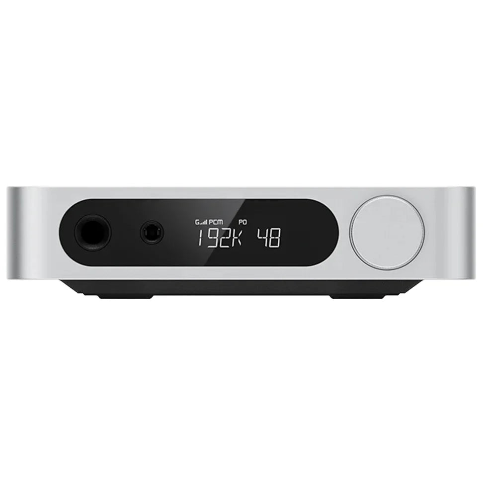 FiiO K11 R2R headphone amplifier and DAC with sleek black design and multiple input options, highlighting its high-quality audio components.