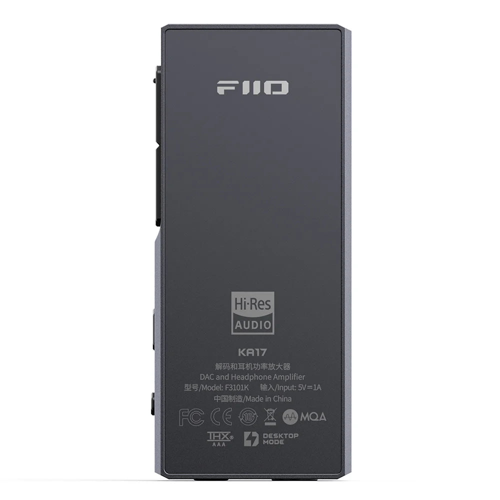 FiiO KA17 headphone amplifier and DAC featuring a sleek black design with multiple ports and control buttons on top.