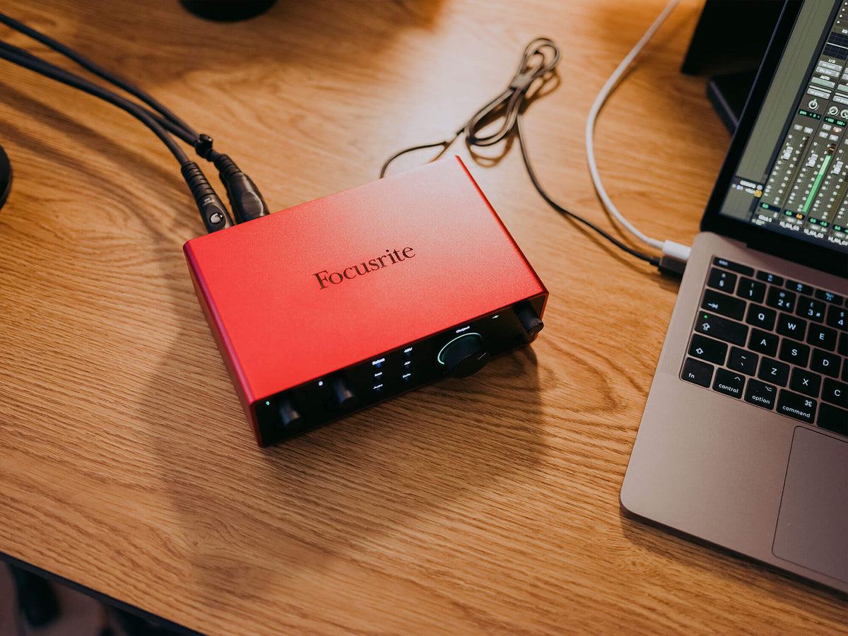 Focusrite Scarlett 4i4 4th Gen audio interface with multiple input and output ports, compact design, and professional-grade build.