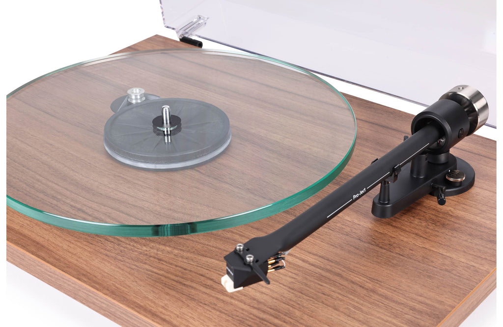 Pro-Ject T2 Super Phono turntable with sleek wooden finish and modern design, featuring tonearm and platter for high-quality vinyl playback.