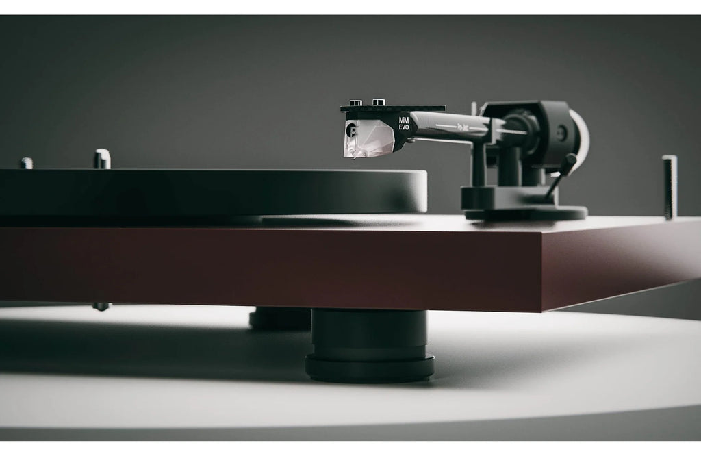 Pro-Ject Debut EVO 2 turntable with black finish and sleek design, featuring tonearm and platter for high-quality vinyl playback.