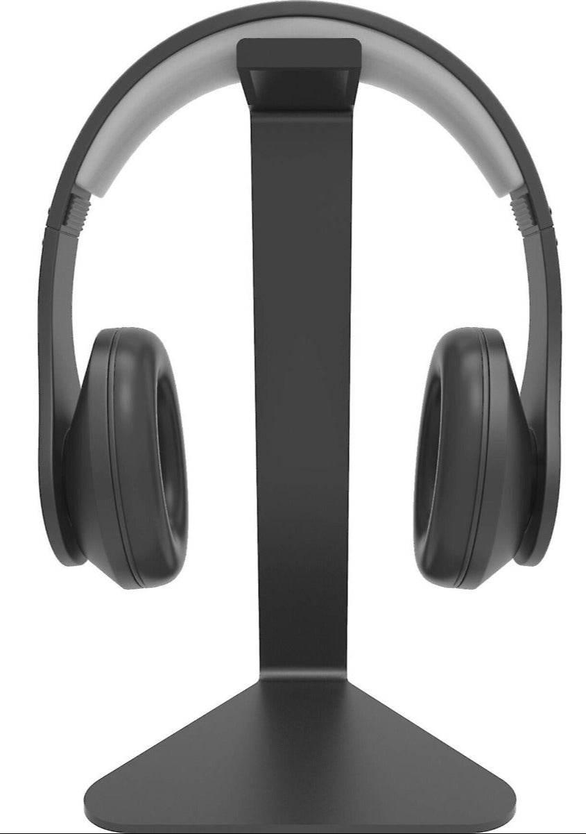 Kanto Audio H1 headphone stand with sleek black design, holding a pair of headphones in a modern workspace setting.