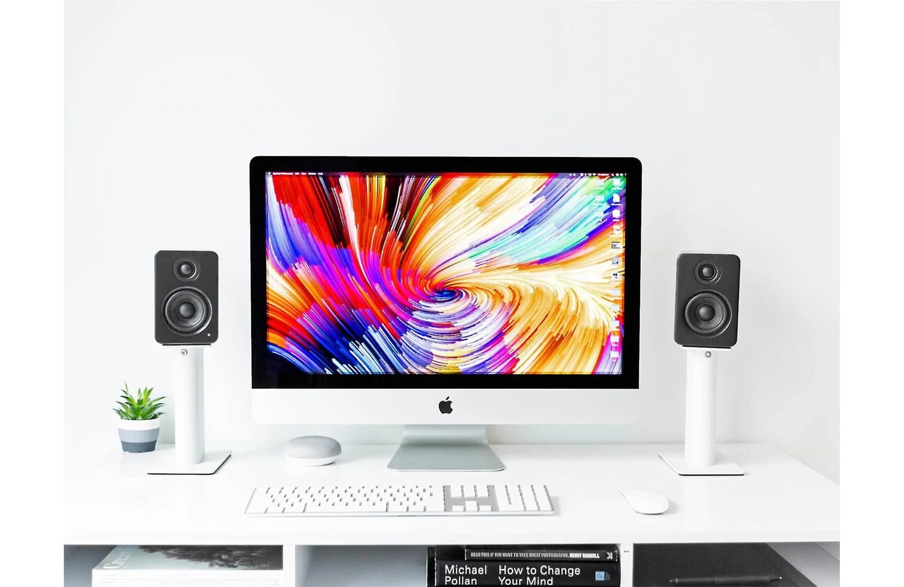 Kanto Audio SP9 9-inch desktop speaker stands holding speakers, with a sleek black finish and sturdy design.