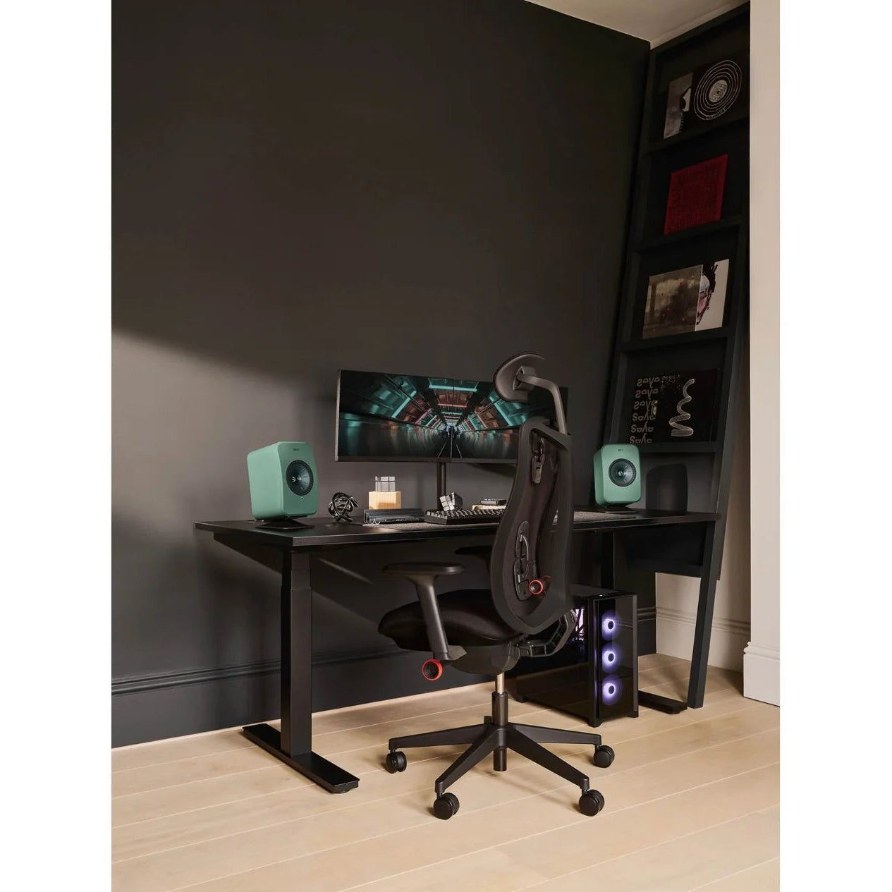 KEF LSX II LT active bookshelf speakers with sleek design and black finish, featuring advanced audio technology and compact size.