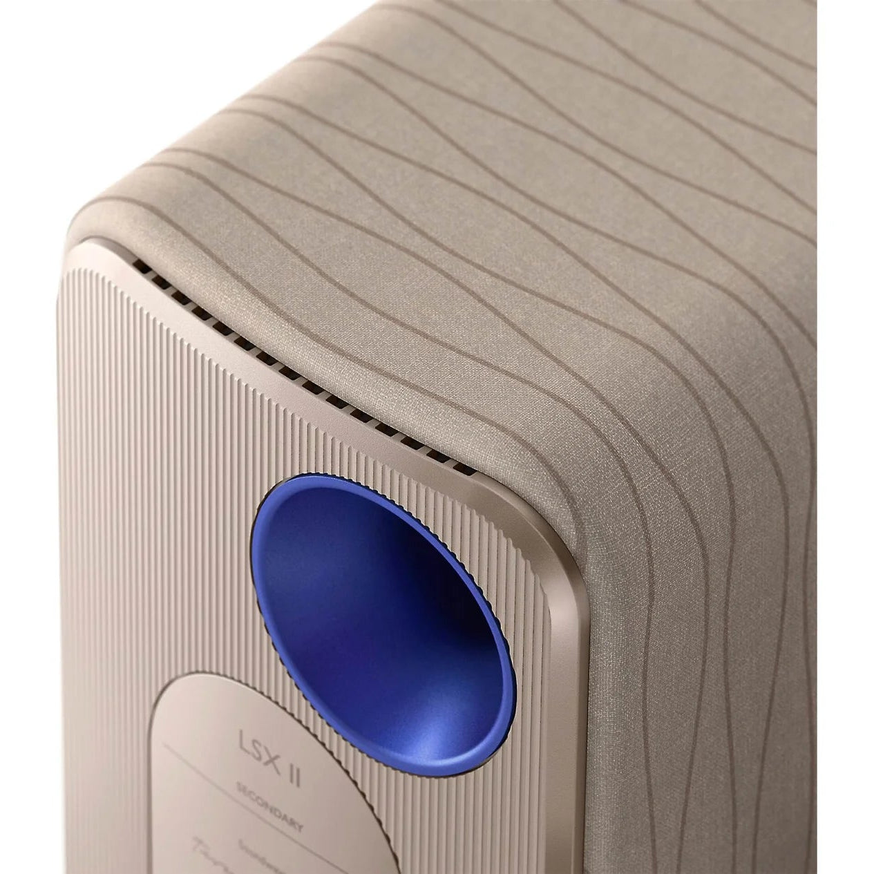 KEF LSX II active bookshelf speakers in white, showing sleek design and compact size with front grille and control panel.