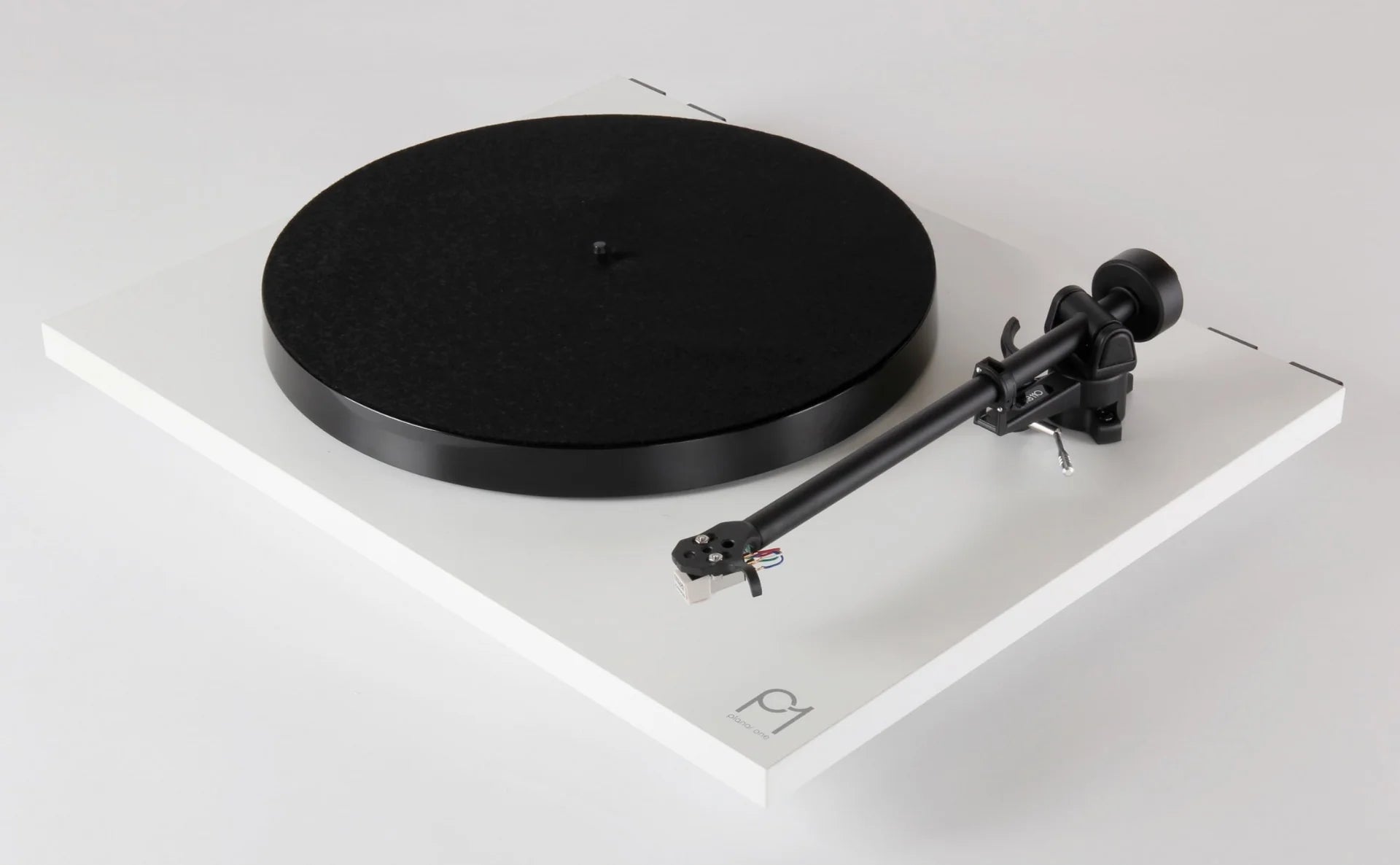 Rega Planar 1 turntable with white matte finish, featuring a sleek design and tonearm for high-quality vinyl playback.