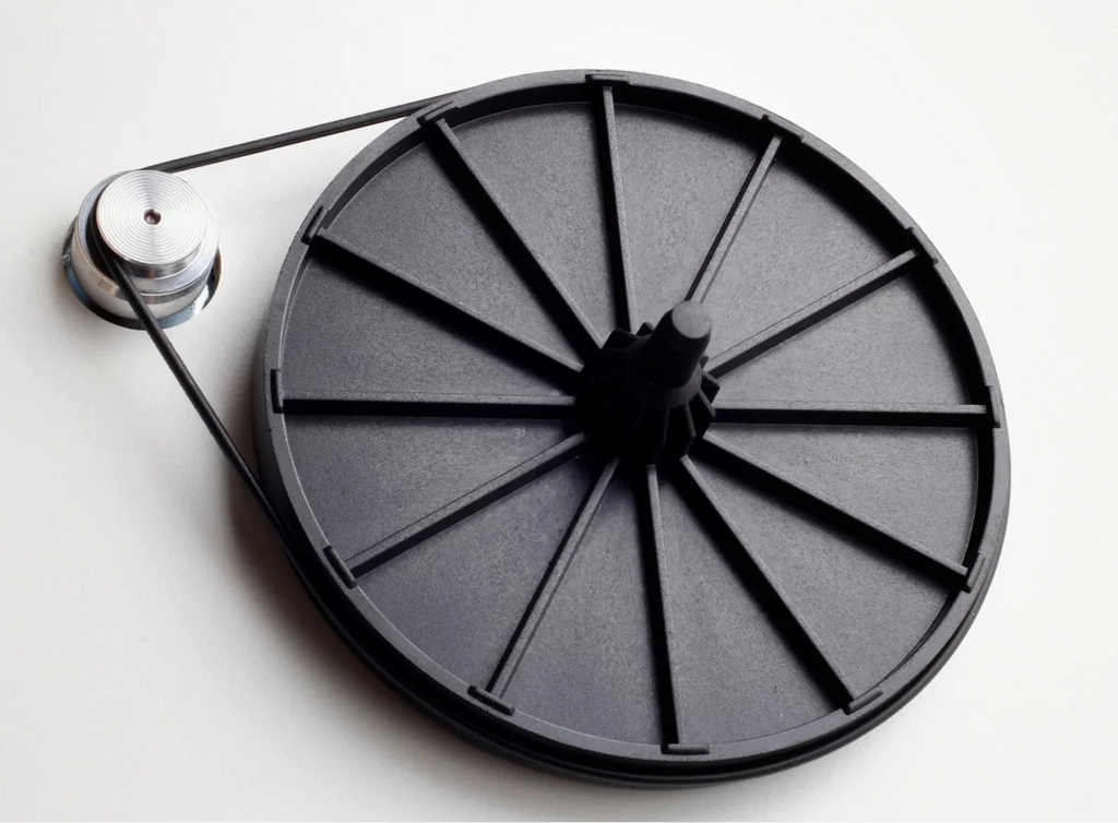 Rega Planar 1 Plus turntable with sleek design, tonearm, and platter, showcasing its high-quality build and modern style.