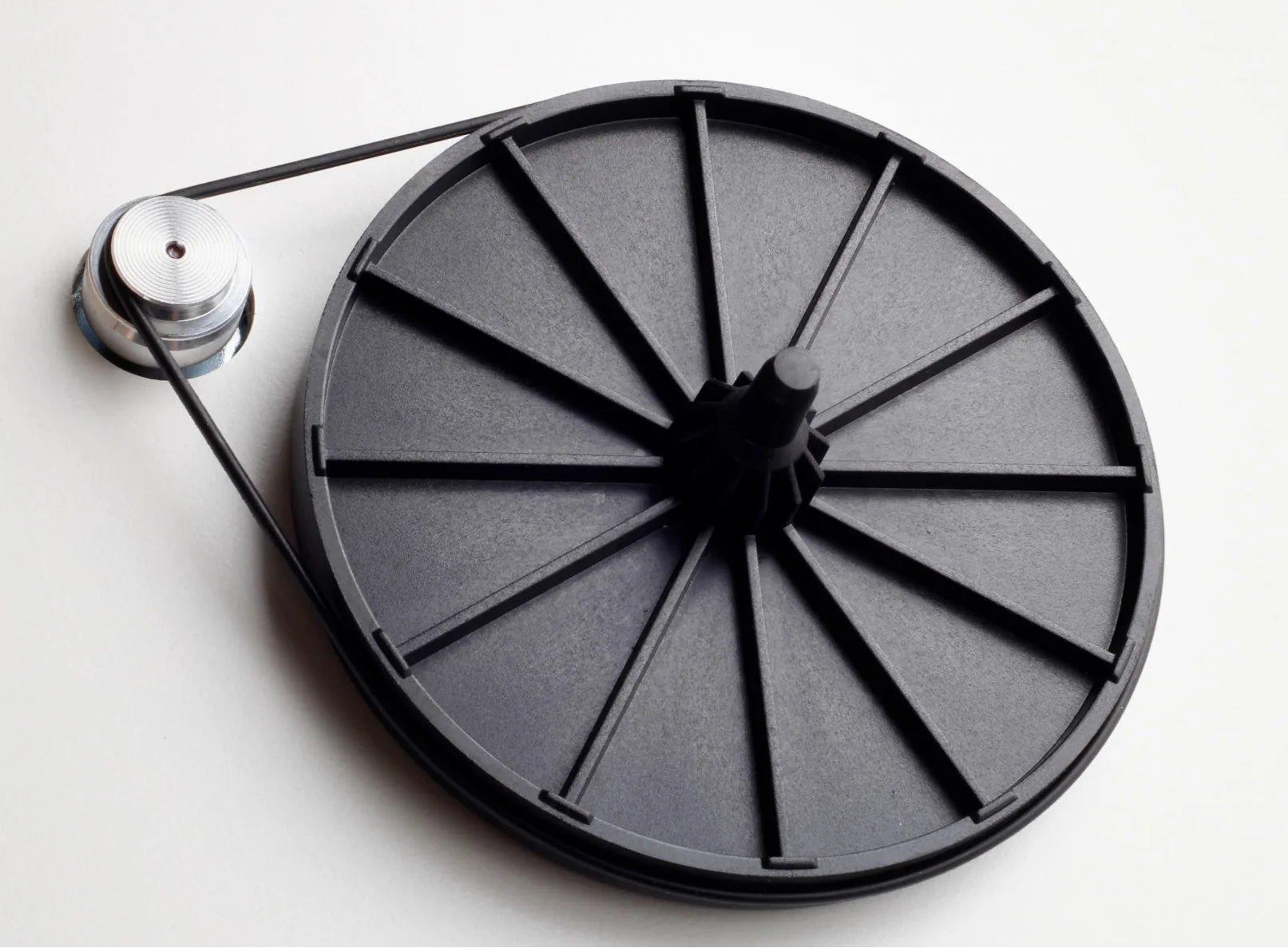 Rega Planar 1 Plus turntable with sleek design, tonearm, and platter, showcasing its high-quality build and modern style.